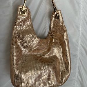 Gold Michael Kors purse